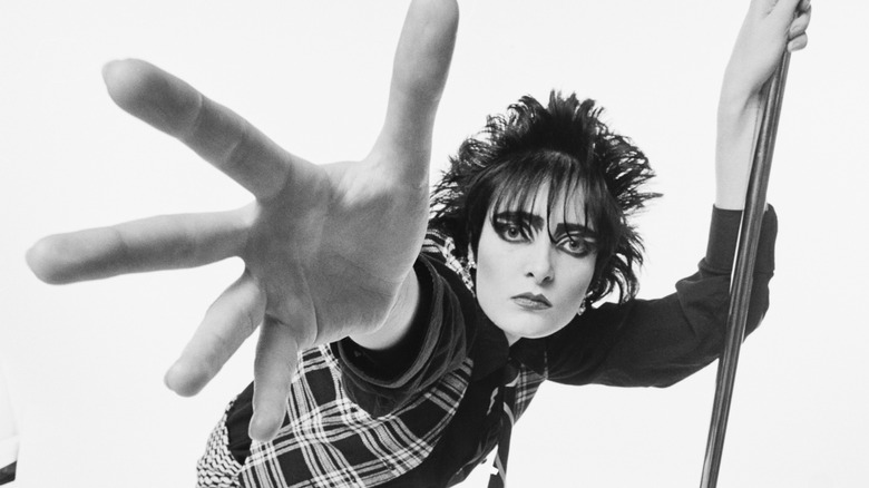 Siouxsie Sioux onstage with microphone