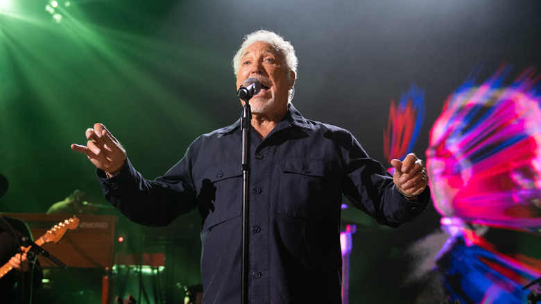 Tom Jones singing on stage