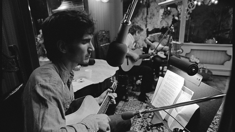 Townes Van Zandt recording in a studio