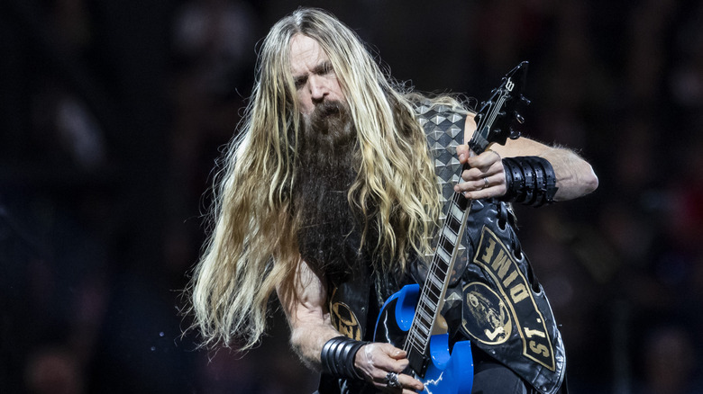 Zakk Wylde playing guitar onstage
