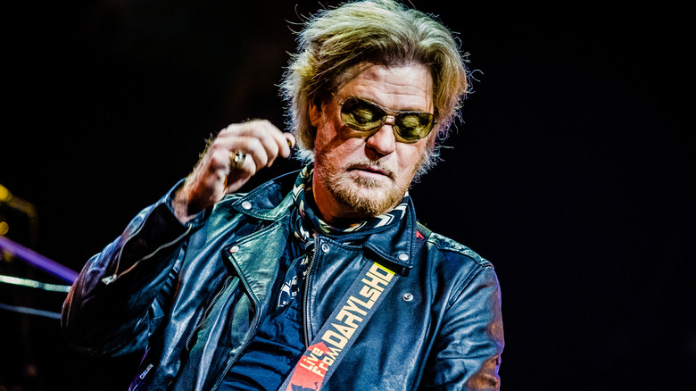 Daryl Hall performing on stage