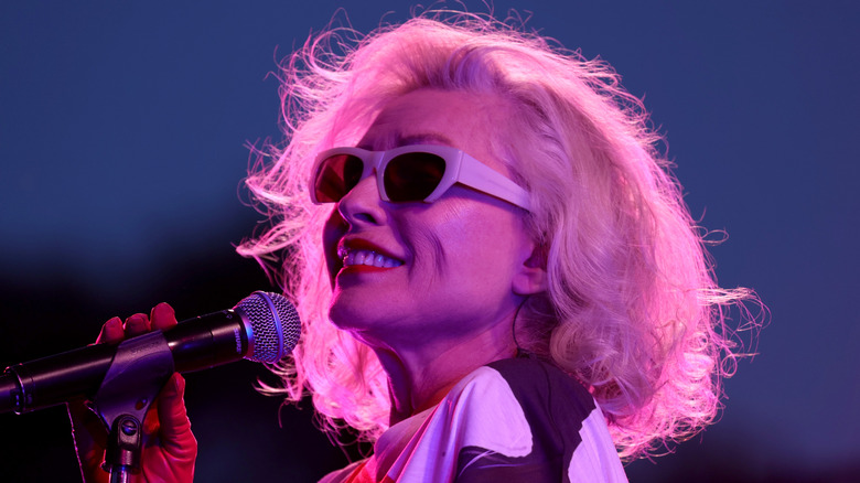 Debbie Harry smiling in sunglasses