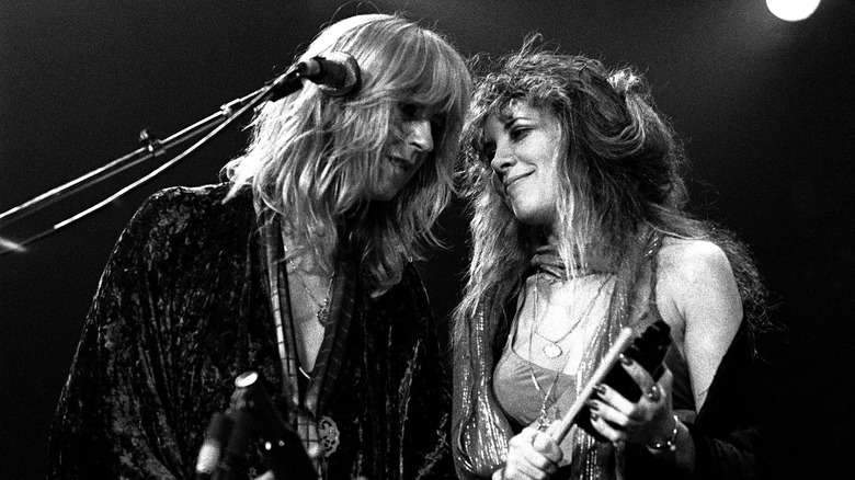 Young Christine McVie and Stevie Nicks onstage