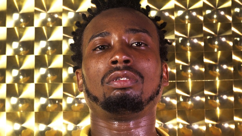 ODB in front of gold background