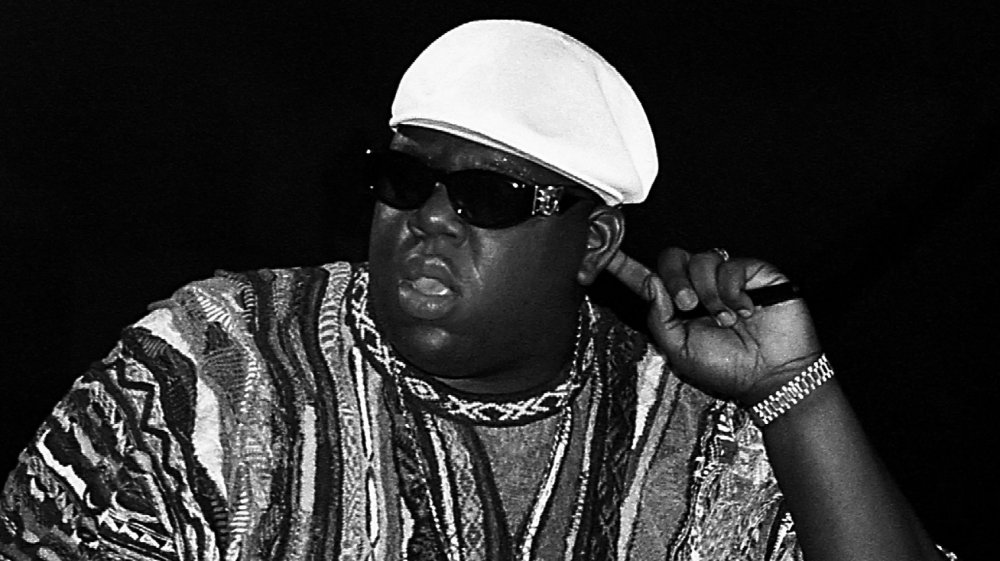 Notorious BIG finger behind ear