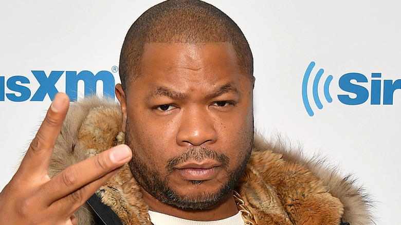 Xzibit flashing hand sign 