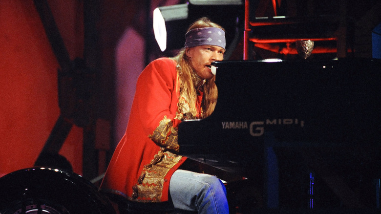 Axl Rose at the piano in the 1990s