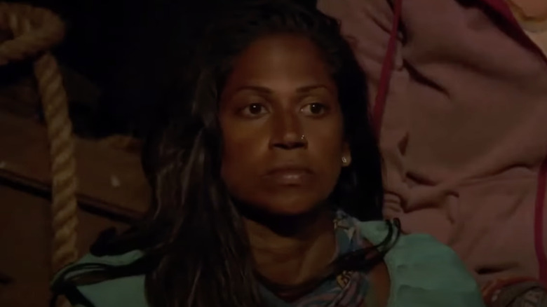 Survivor contestant tooks tense at Tribal Council meeting