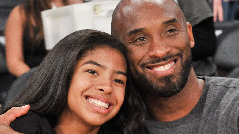 Kobe Bryant and his daughter Gianna at a basketball game in 2019