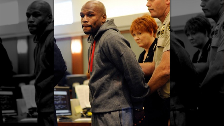 Mayweather put in handcuffs