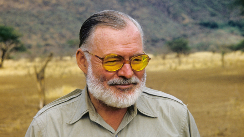 Ernest Hemingway stands outside during big game hunt in Kenya