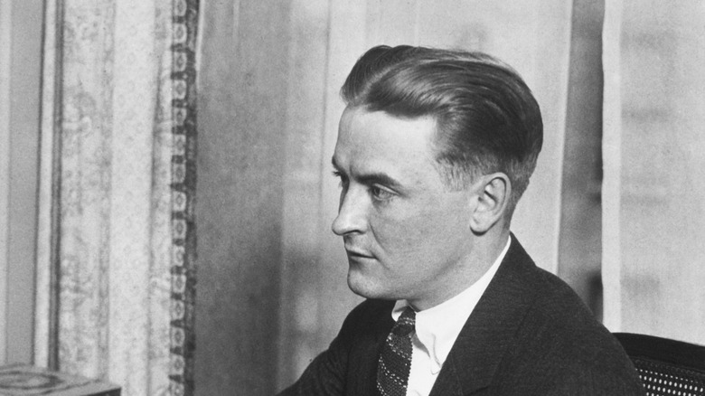F. Scott Fitzgerald writing at desk