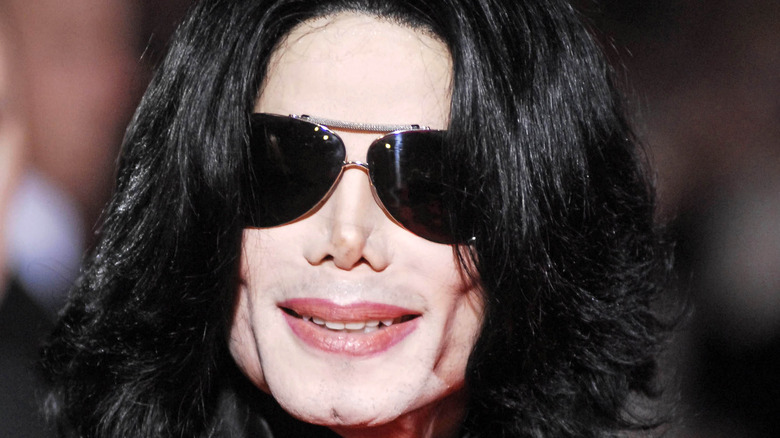 Michael Jackson with long hair and aviators