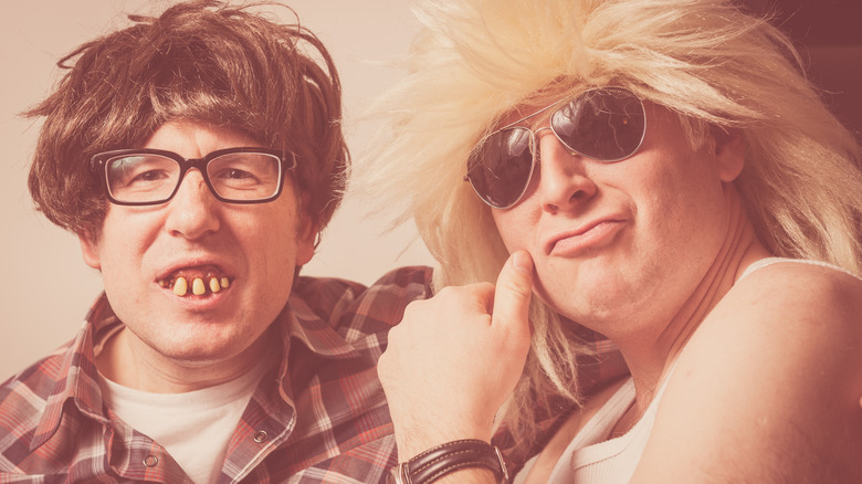 Photo of people wearing fake teeth