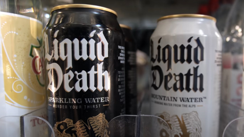 Cans of Liquid Death in a store