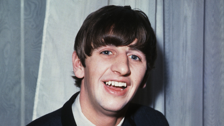 Ringo Starr smiling in Beatles era publicity photo
