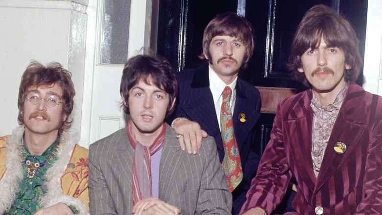 The Beatles posing at a 1967 press party