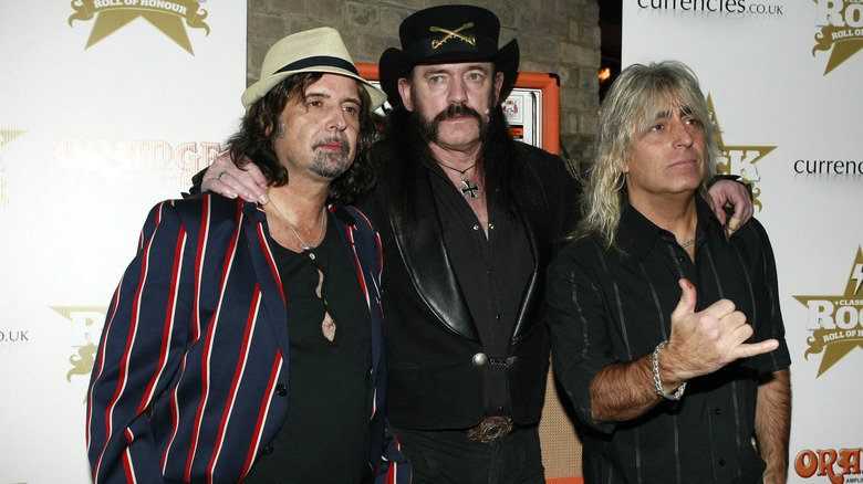 Motorhead's Phil Campbell, Lemmy Kilmister and Mikkey Dee pose for a photo at the Classic Rock Roll of Honour Awards in 2012