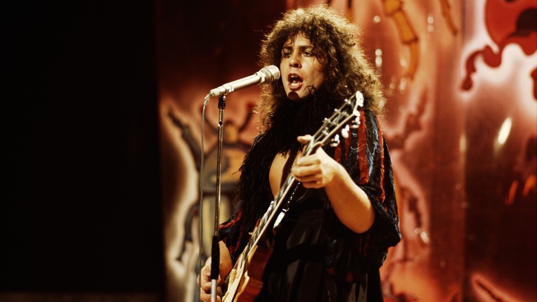 T.Rex's Marc Bolan singing and playing guitar at the Top of the Pops in 1973