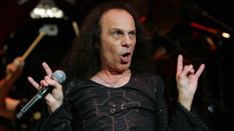Ronnie James Dio showing the metal horns in 2007