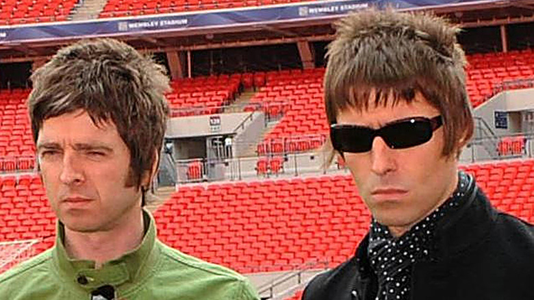 Noel  and Liam Gallagher looking serious