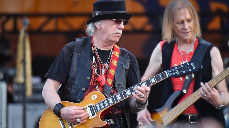 Brad Whitford playing guitar onstage 2018