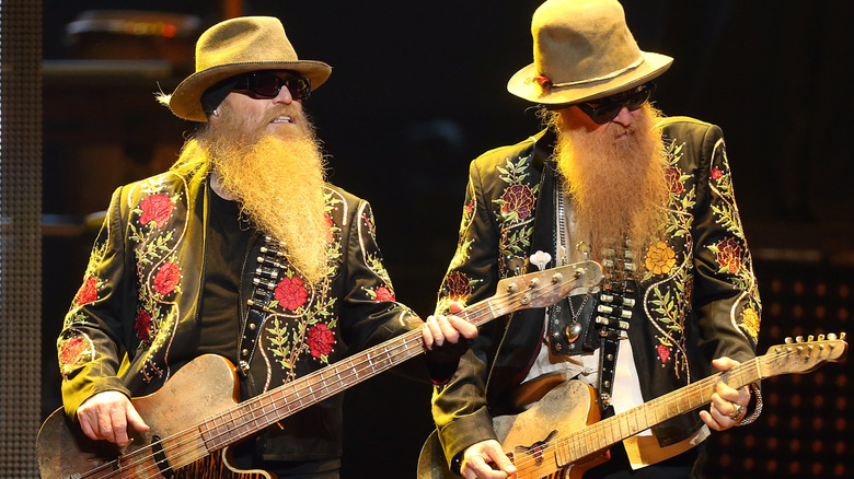 Dusty Hill and Billy Gibbons of ZZ Top playing on stage