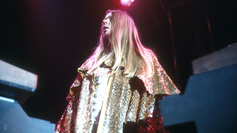 Rick Wakeman performing in golden cape, c. 1970