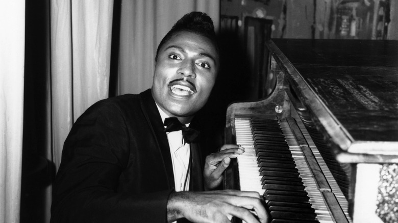 Little Richard performing at piano