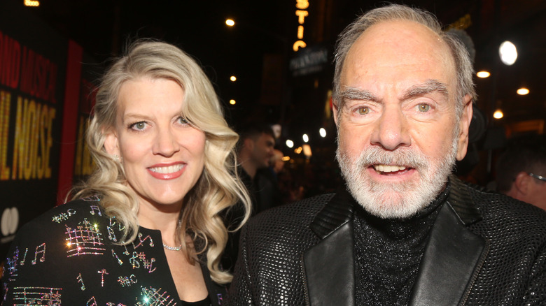 Katie McNeil and Neil Diamond smiling outside Broadway theater
