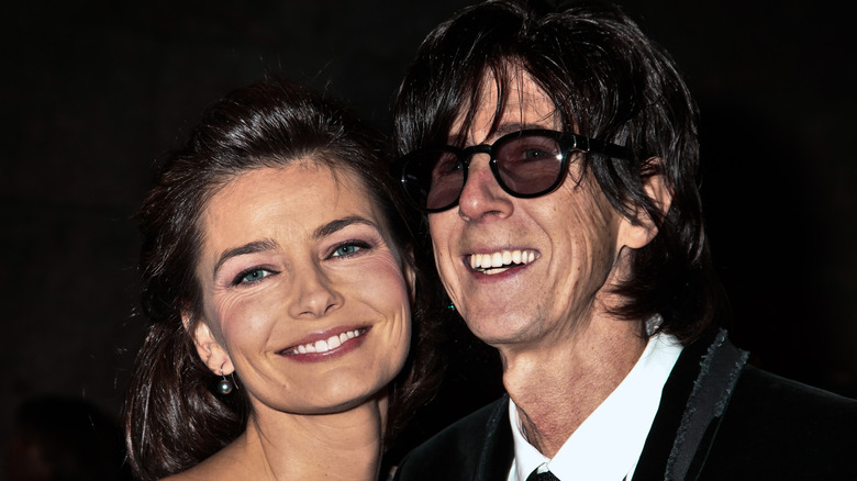 Paulina Porizkova and Ric Ocasek smiling with heads close