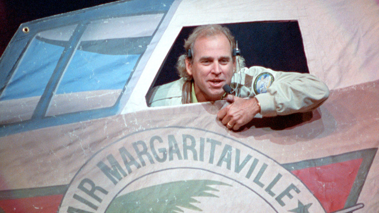 Jimmy Buffett in concert, in a faux Air Margaritaville airplane