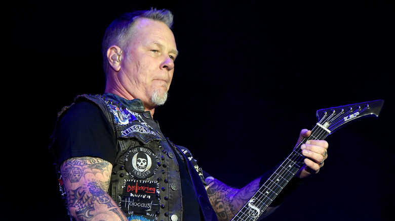 James Hetfield onstage holding guitar