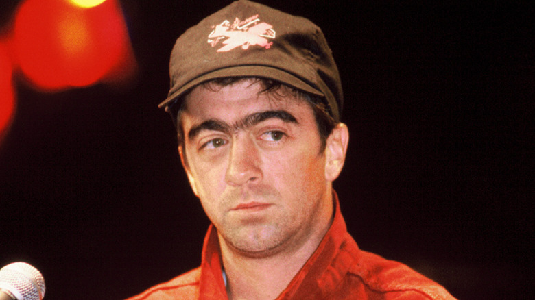 Bill Berry wearing a baseball cap