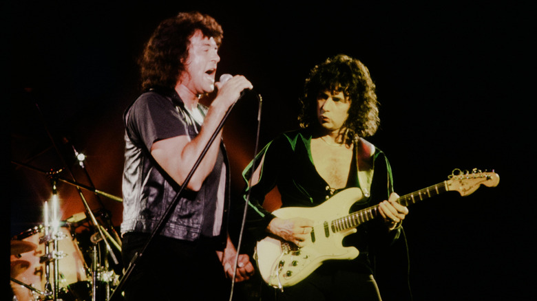 Ritchie Blackmore and David Coverdale performing on stage.