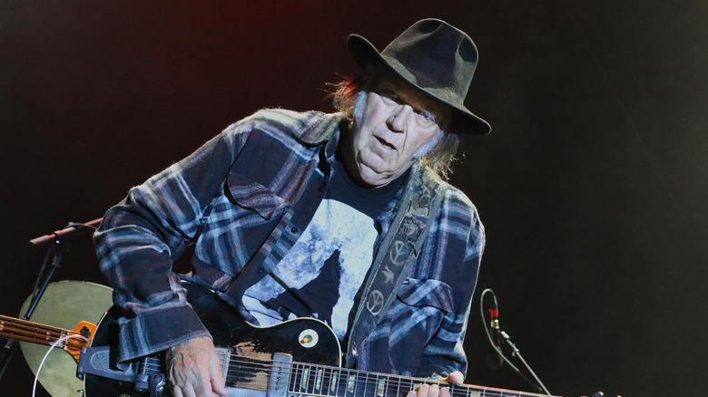 Neil Young playing guitar