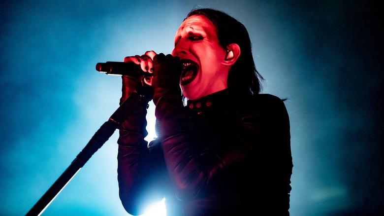 Marilyn Manson singing on stage in 2025