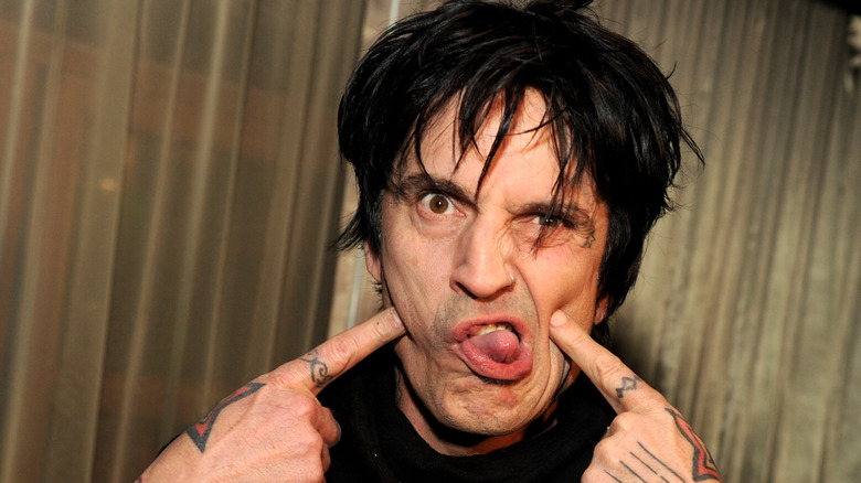 Tommy Lee pulling a face