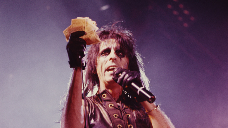 Alice Cooper performing on stage in the late 1980s