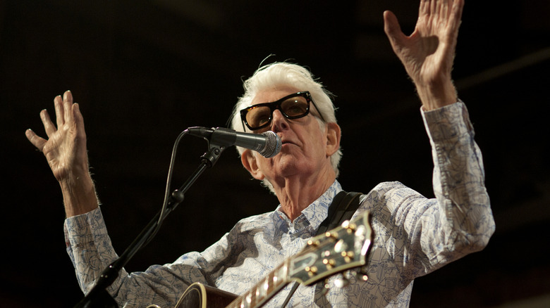 Nick Lowe performing in 2022