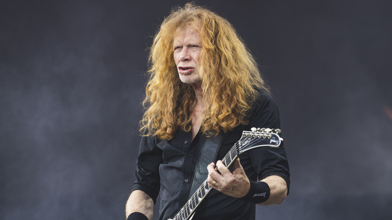 Dave Mustaine playing guitar on stage