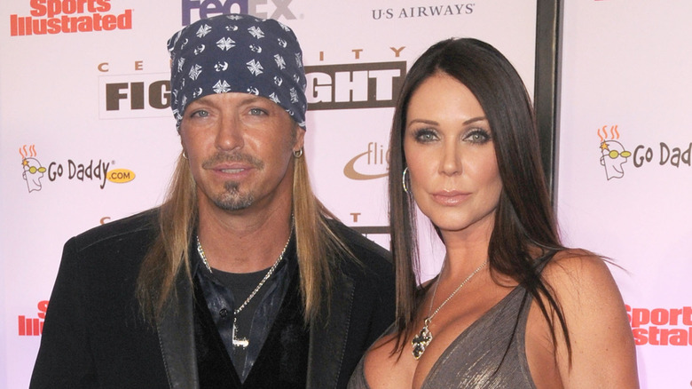 Poison's Bret Michaels and Kristi Gibson posing together