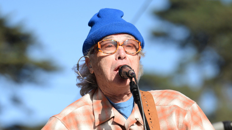 Ry Cooder playing singing on stage