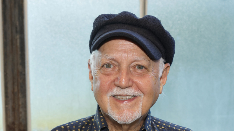 Phil Keaggy in hat smiling