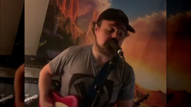 Matthew Fleming playing guitar