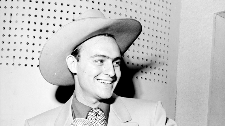 Wesley Tuttle smiling in recording booth