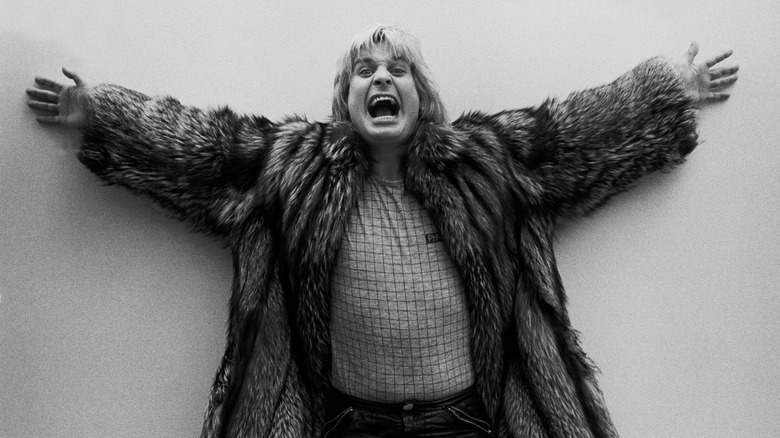 Ozzy Osbourne clowning around for camera