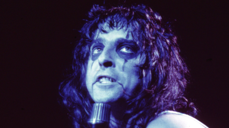 Alice Cooper in stage makeup performing