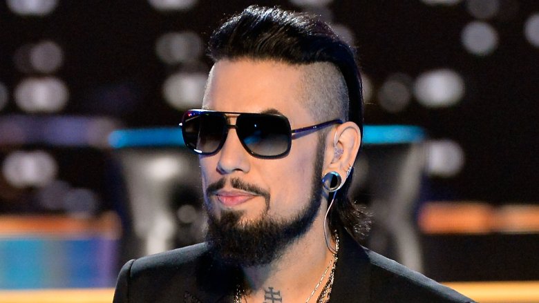 Dave Navarro staring ahead in sunglasses