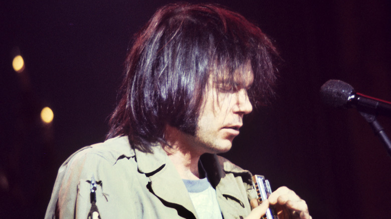 Neil Young looking down during The Last Waltz